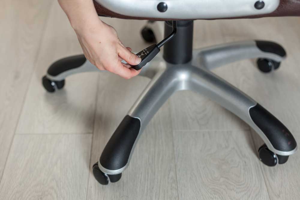 Adjusting your chair and sitting correctly